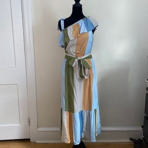 Super Cute Spring dress. Sleeveless and comes w belt! All the colors of spring!